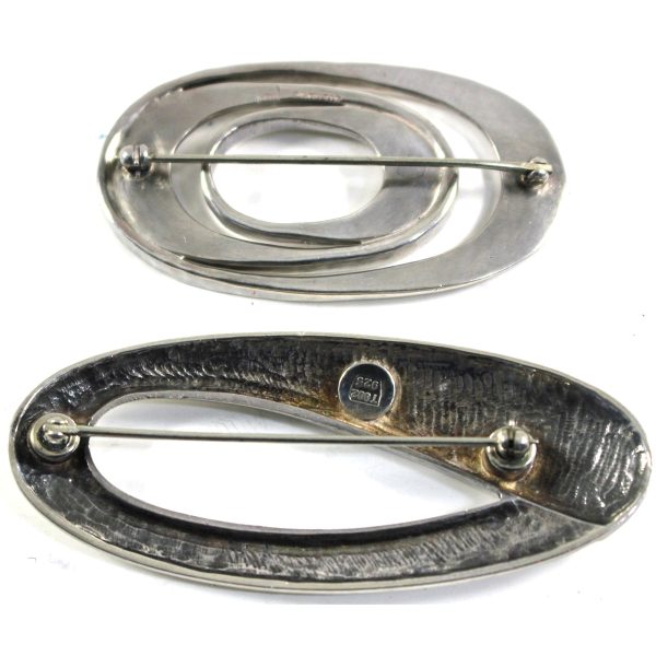 Pair of Vintage Modernist Sterling Silver Brooches For Sale